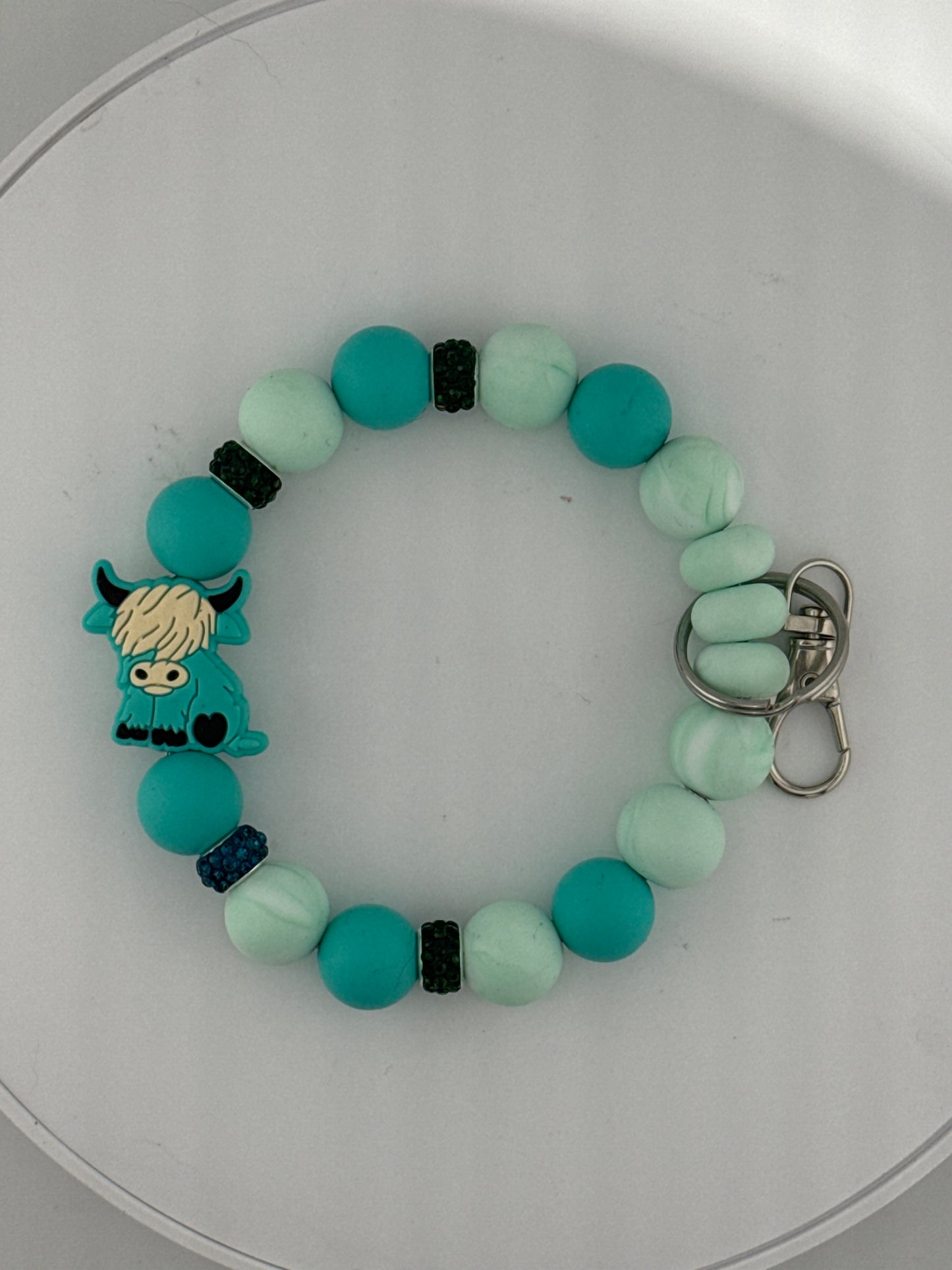 Beautifully Understated Turquoise Cow Wristlet