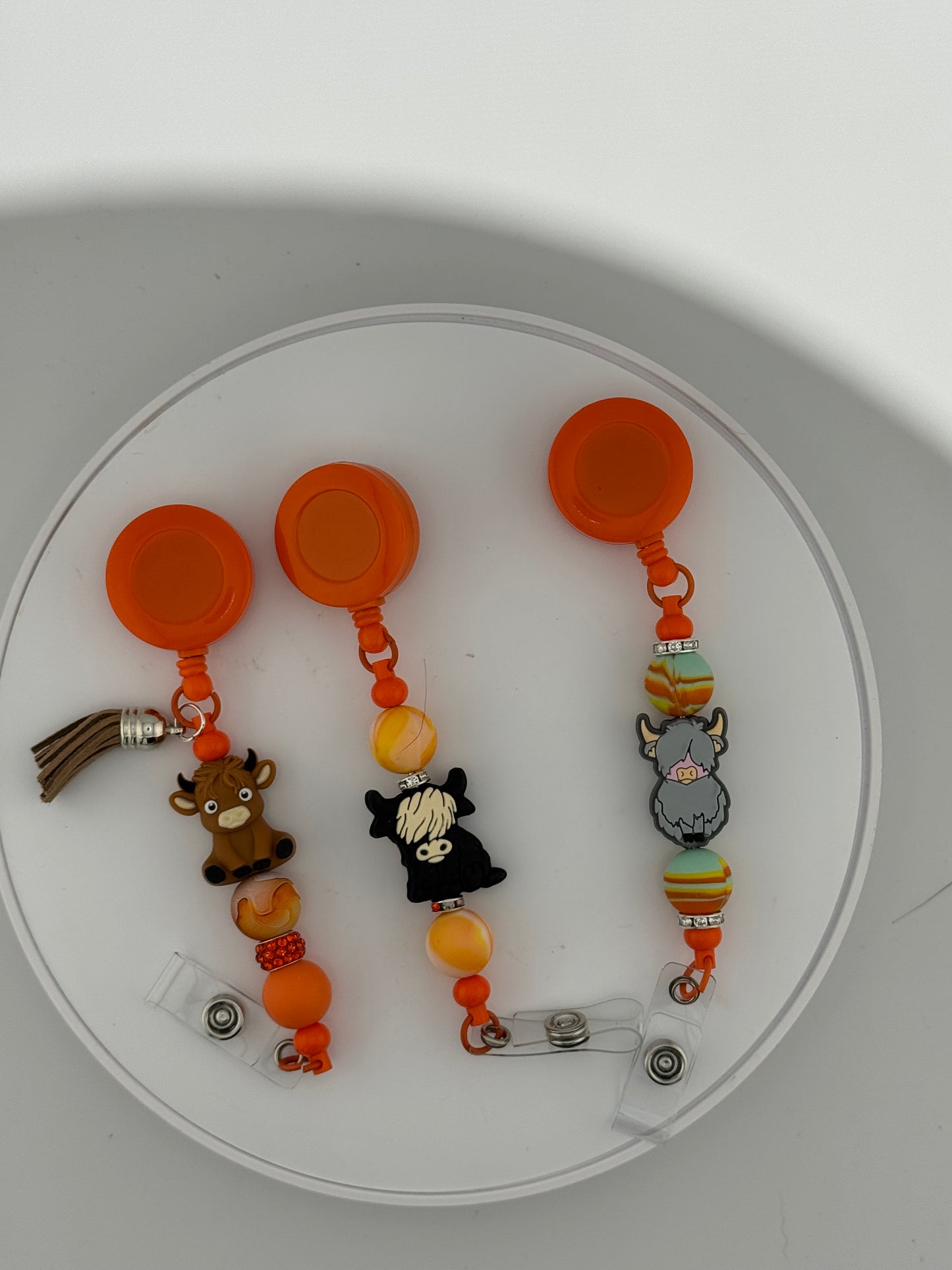 Orange Bright Badge Reels