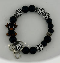 Classic Black and White & Sparkle Cow Wristlet