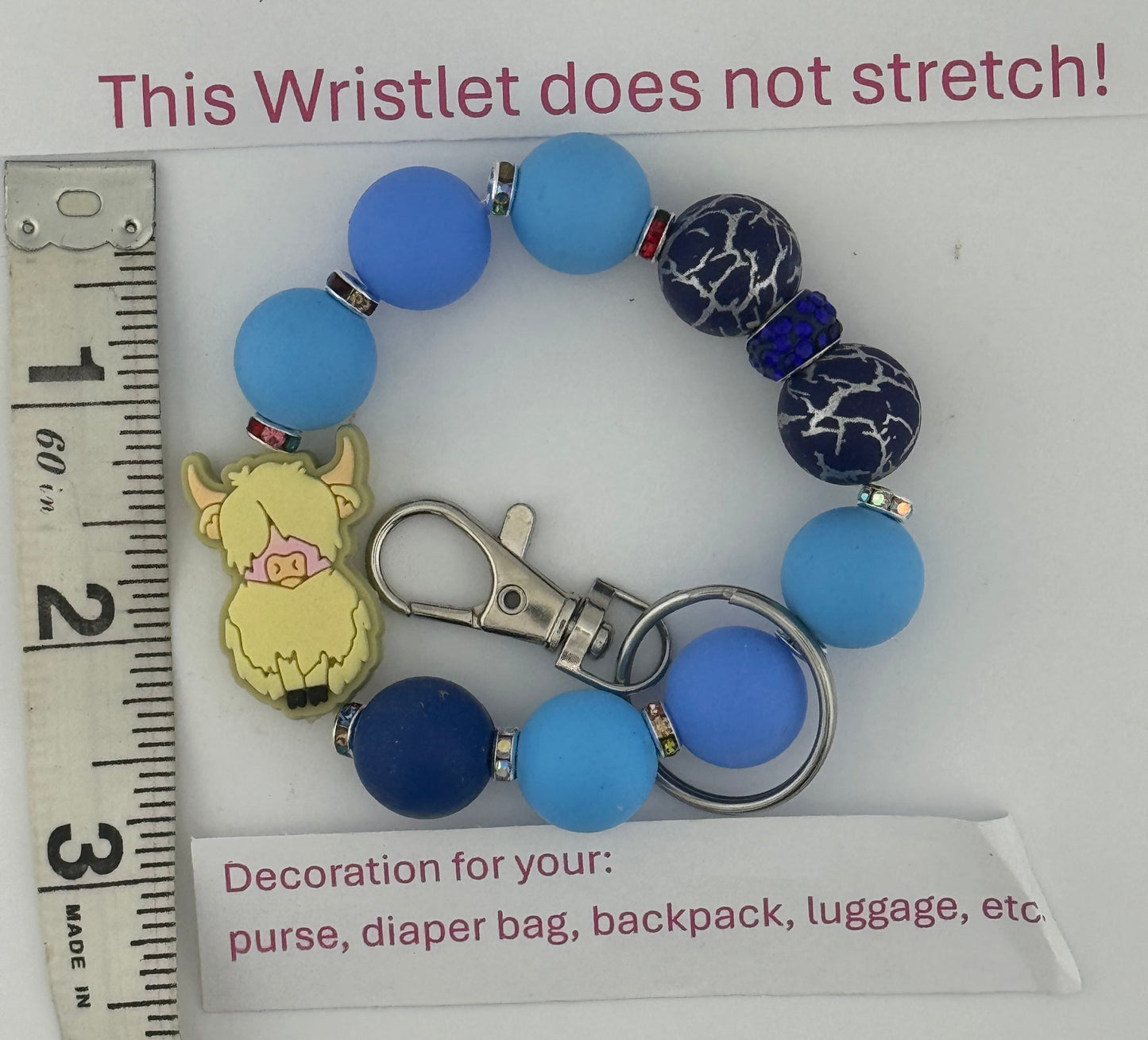 Charming Blue Wristlet with Blonde Highland Cow