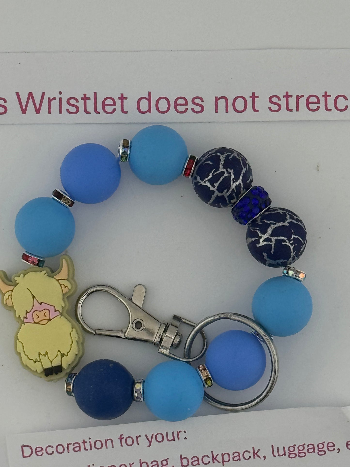 Charming Blue Wristlet with Blonde Highland Cow