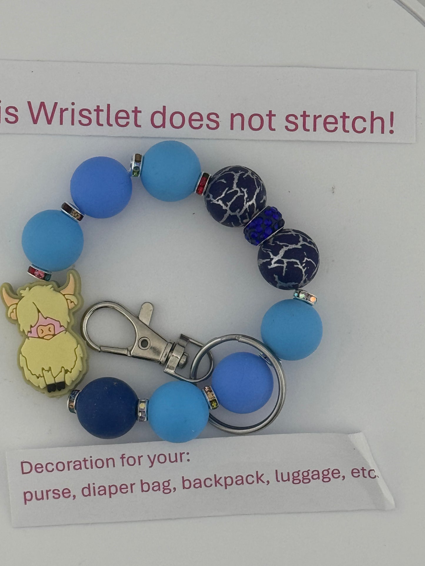 Charming Blue Wristlet with Blonde Highland Cow