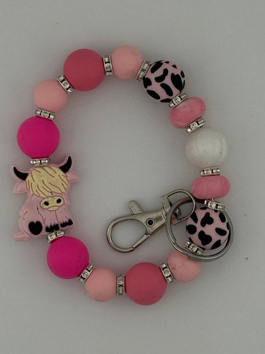 Pink Sparkle Highland Cow Wristlet to Decorate Your Personal Belongings