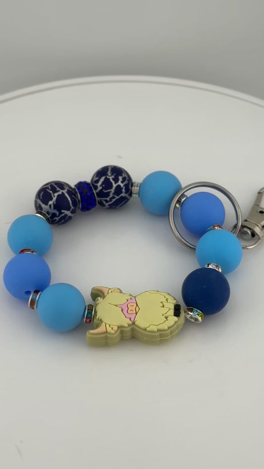 Charming Blue Wristlet with Blonde Highland Cow